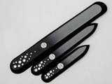 A set of three glass nail files with Swarovski crystals