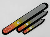 A set of three glass nail files with Swarovski crystals