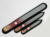 A set of three glass nail files with Swarovski crystals