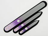 A set of three glass nail files with Swarovski crystals